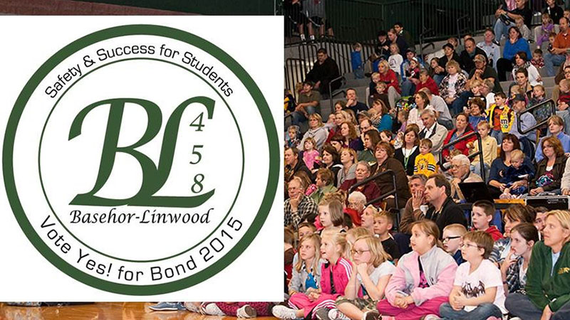 2015 USD 458 Bond Logo with students and parents in the background