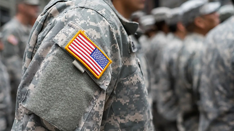 Photo of a soldiers sleeve with an American Flag patch attached.